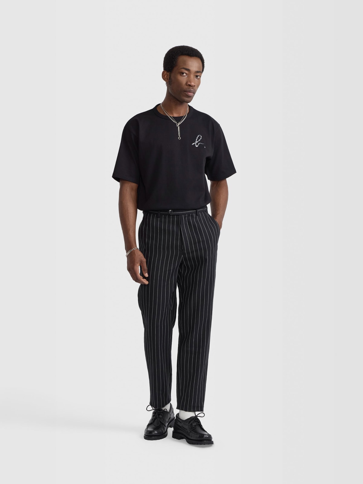 black Noamm striped linen trousers